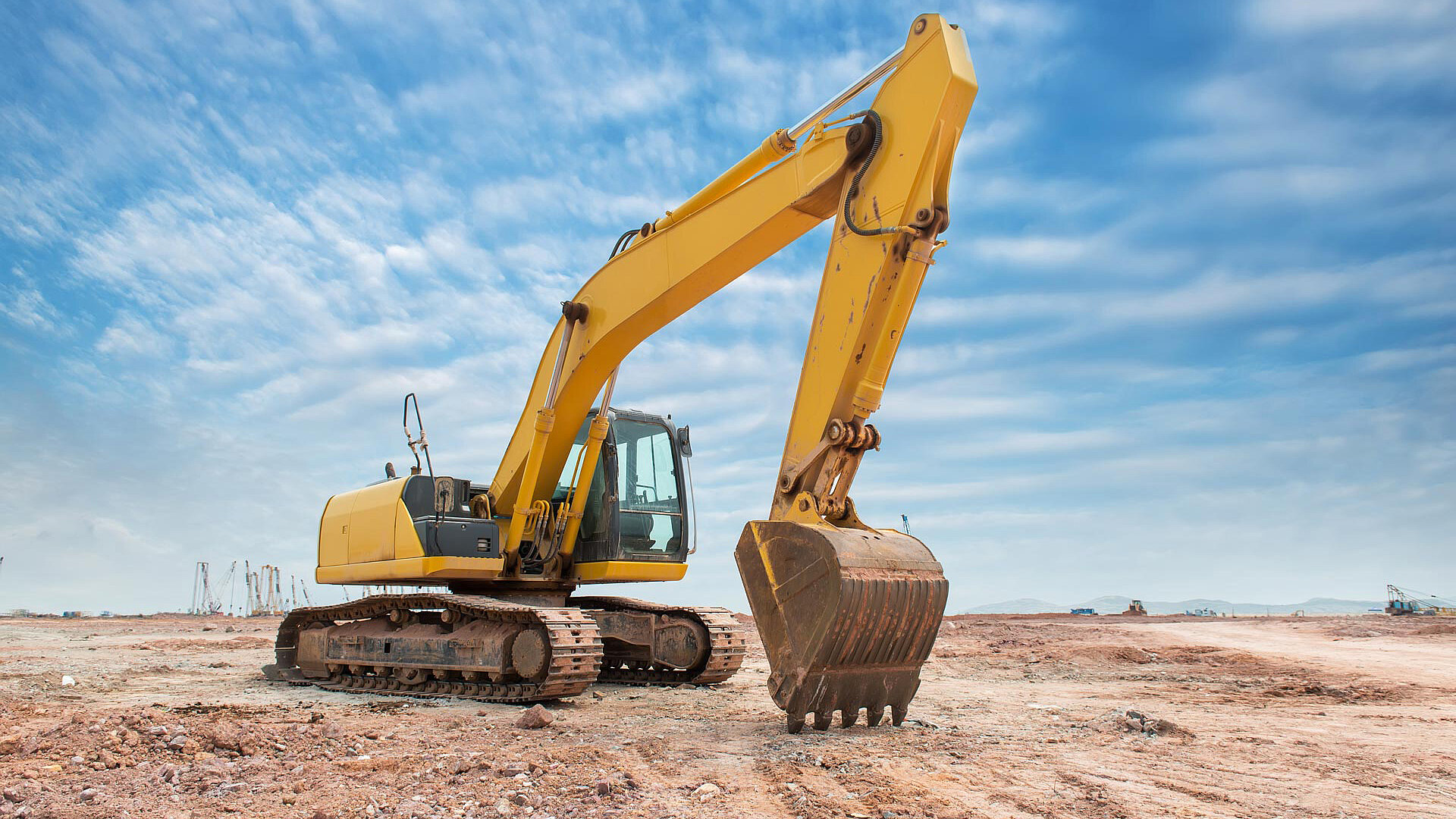 Bagger/Baumaschine auf Baustelle/ Erde