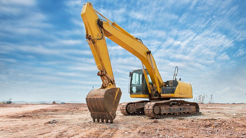 Bagger/Baumaschine auf Baustelle/ Erde