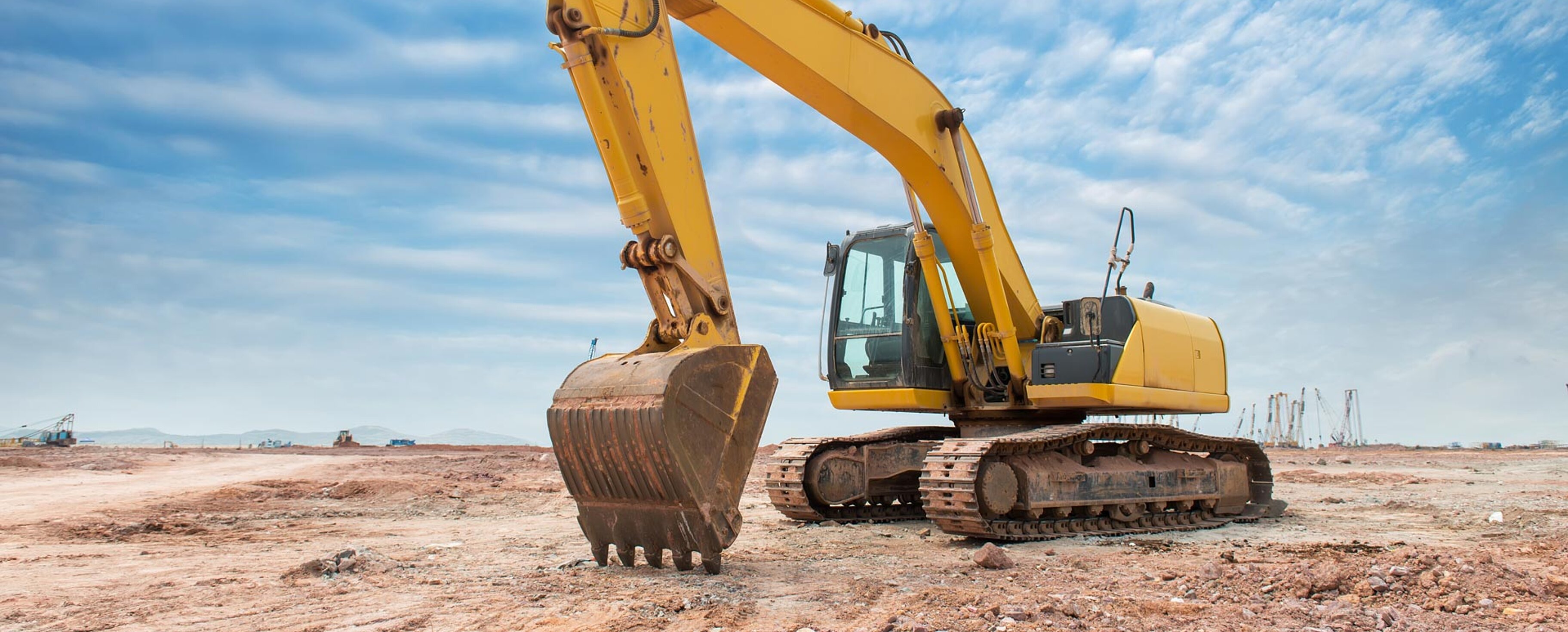 Bagger/Baumaschine auf Baustelle/ Erde