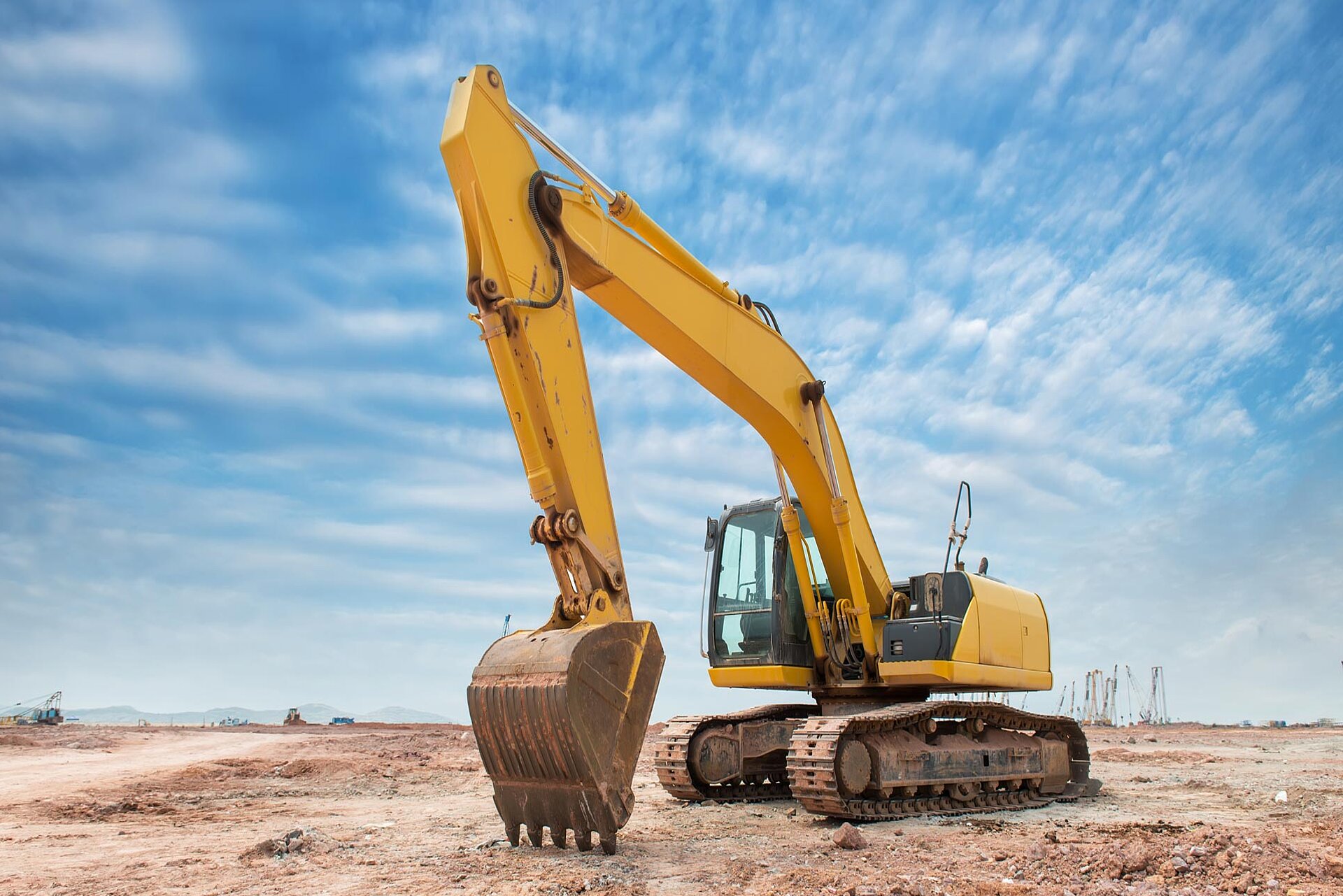 Bagger/Baumaschine auf Baustelle/ Erde