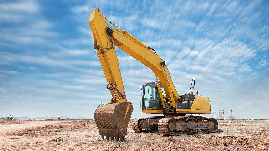 Bagger/Baumaschine auf Baustelle/ Erde