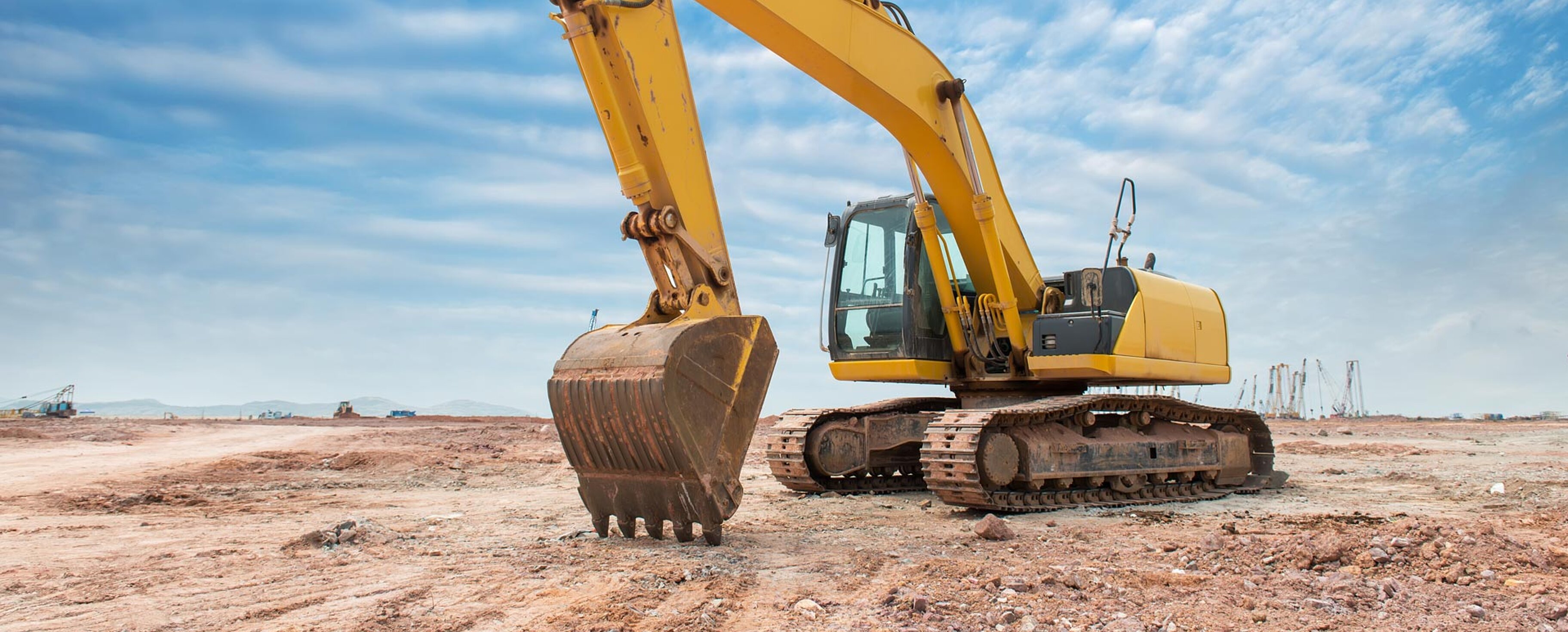 Bagger/Baumaschine auf Baustelle/ Erde